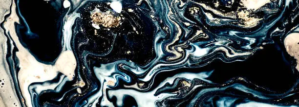 Photo of Natural Luxury. Marbling pattern. Style incorporates the swirls of marble or the ripples of agate. Ancient oriental drawing technique.