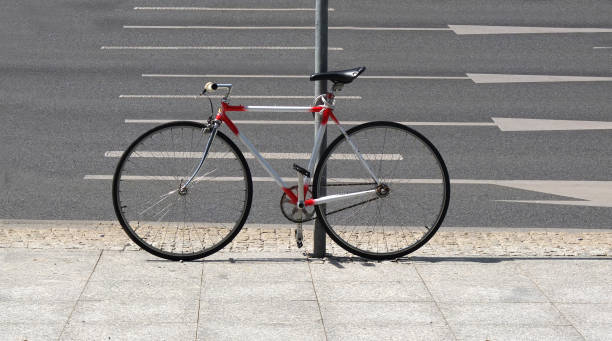 istock Bicycle pinned to the post 971387270