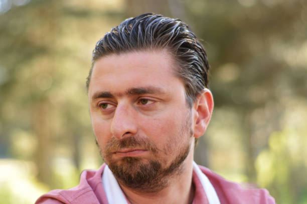 istock Young man's outdoors portrait 971387752