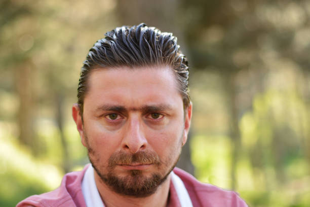 istock Young man's outdoors portrait 971387756