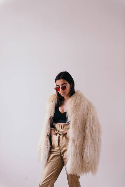 istock Female model in trendy clothes 971399574