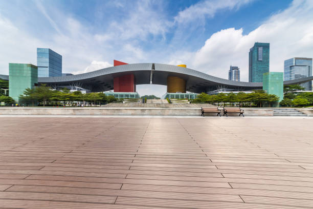 istock Panoramic skyline and modern business office buildings with empty road,empty concrete square floor 971400684