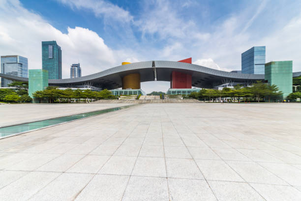 istock Panoramic skyline and modern business office buildings with empty road,empty concrete square floor 971400734