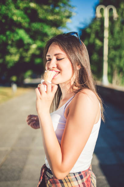 istock Girl eating ice cream 971403776