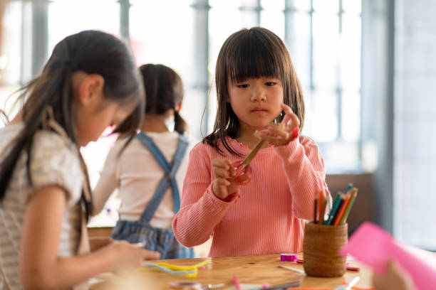 istock Young group of students in an arts and crafts class 971403828