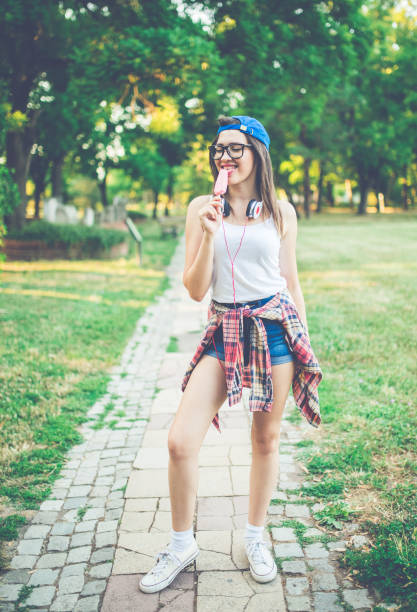 istock Girl licking ice cream 971404746
