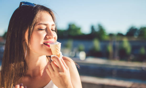istock Girl eating ice cream 971409618