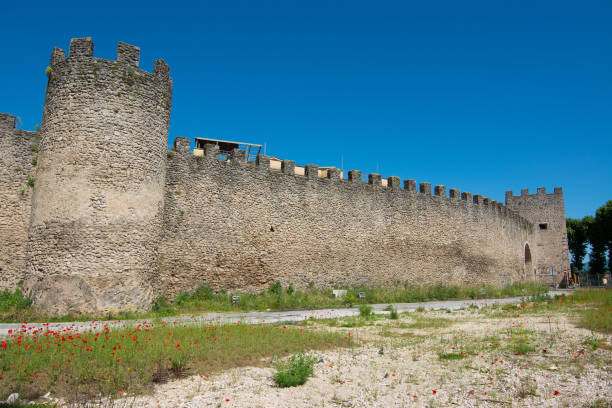 Tourist view of Rieti, in Lazio, Italy. The medieval walls and the gateway Tourist view of Rieti, in Lazio, Italy. The medieval walls and the gateway rieti stock pictures, royalty-free photos & images