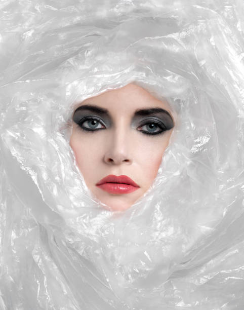 Beautiful women behind a plastic wrap wallpaper background