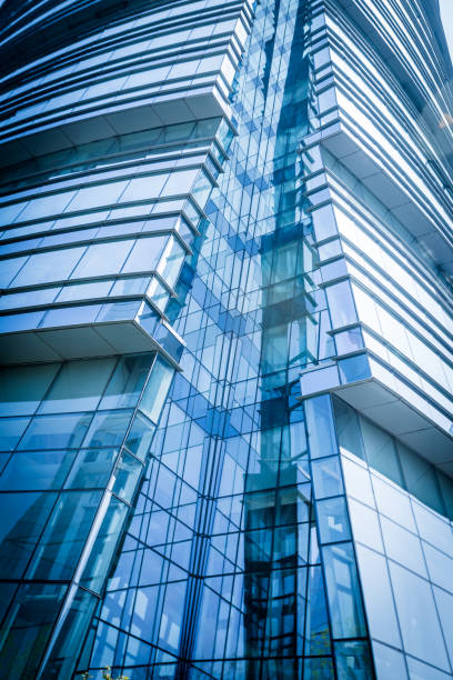 istock background of the glass modern office building 971416632