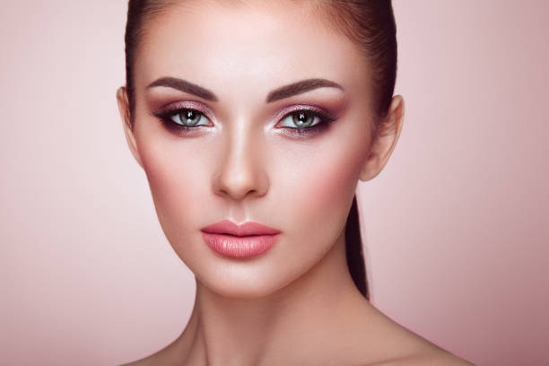 istock Beautiful woman face with perfect makeup 971419940