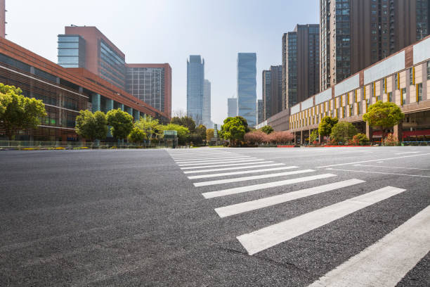 istock Panoramic skyline and modern business office buildings with empty road,empty concrete square floor 971423390