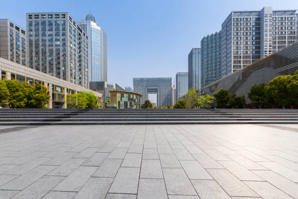istock Panoramic skyline and modern business office buildings with empty road,empty concrete square floor 971423770
