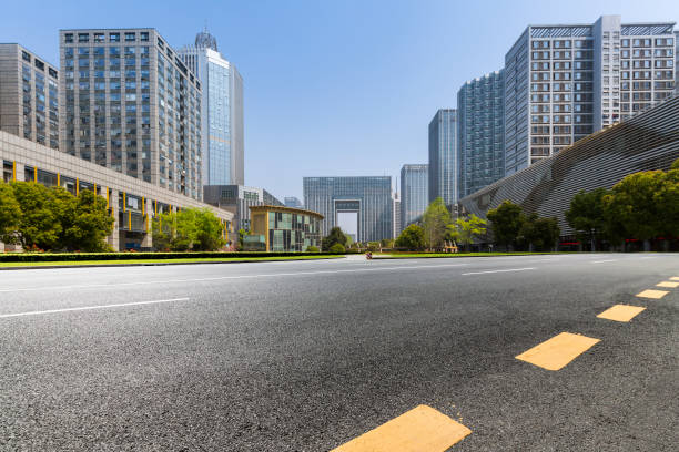 istock Panoramic skyline and modern business office buildings with empty road,empty concrete square floor 971425970