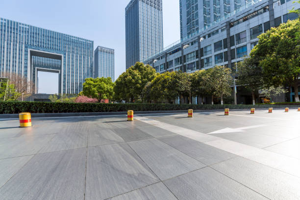 istock Panoramic skyline and modern business office buildings with empty road,empty concrete square floor 971432618