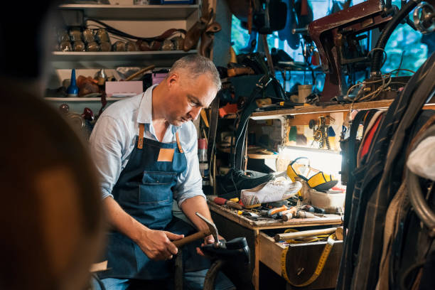 istock Craftsman making luxury handmade man shoes 971437382