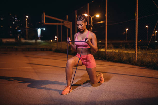 istock Fit girl training at night 971459680