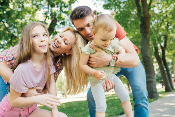 istock Young ecstatic family together 971500552