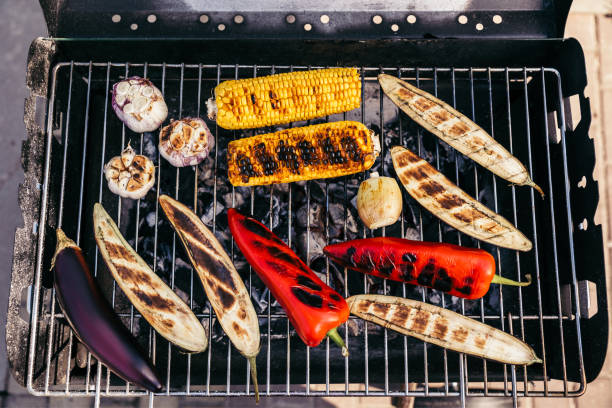 istock Summer seasonal vegetables cooked outdoors on grill 971503632