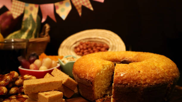 istock Festa Junina traditional food on dark background. Seletive focus on cake. Copy space for text. Brazilian June Feast. 971507882