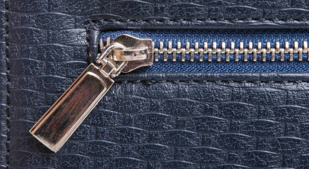 istock skin background with zipper close-up 971513116