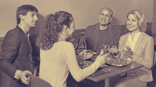 istock Positive  middle class people enjoying food and wine 971514304