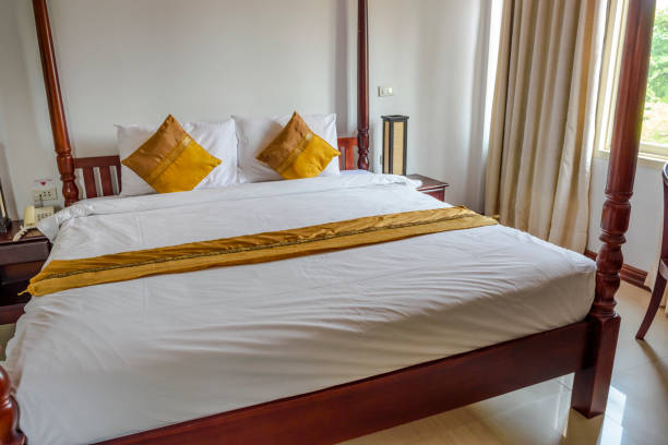 istock Hotel room with beautiful bed 971529648