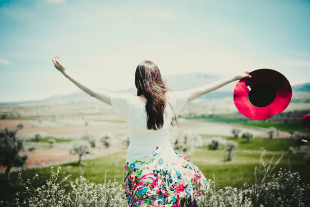 istock a young woman in the spring 971548352