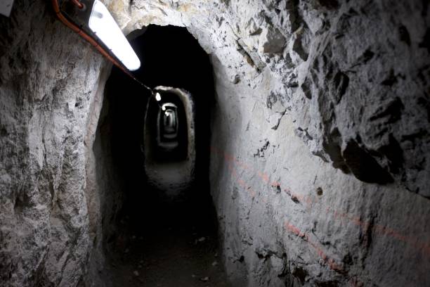 istock Narrow rock tunnel 971548574