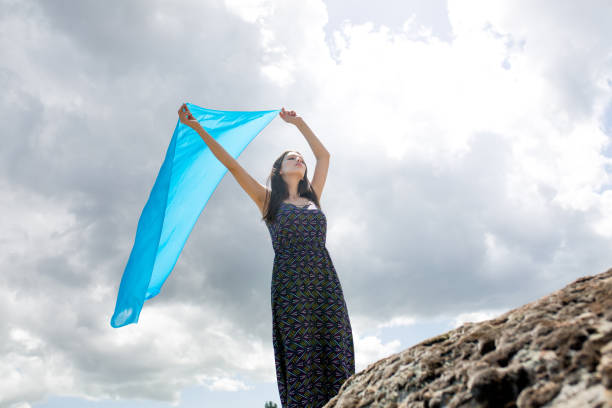 istock a young woman in the spring 971560988