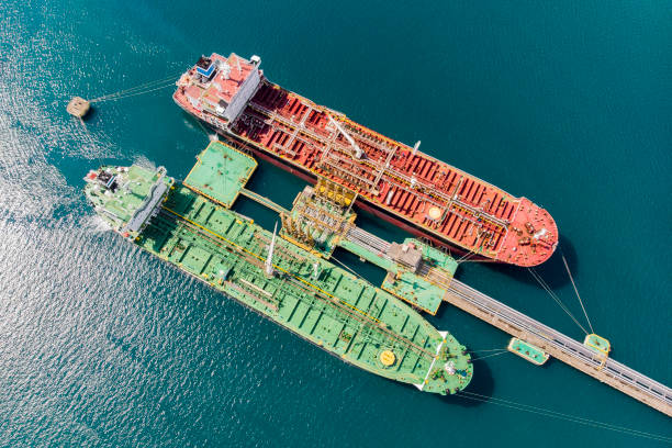 istock Oil tankers unloading oil 971567740