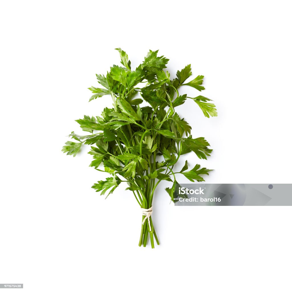 Fresh organic parsley  on white background; flat lay Fresh organic parsley on white background; flat lay; white background Parsley Stock Photo
