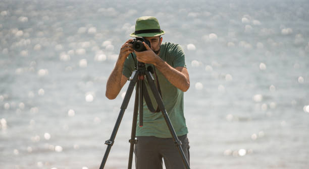 istock Photographer at the lake 971579534
