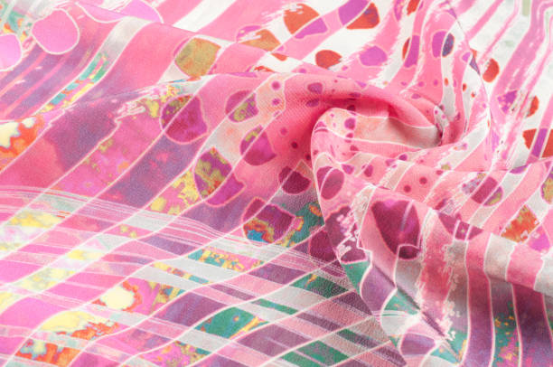 istock Texture background image, Silk fabric with abstract pattern. Colorful silk fabric close-up. Filtered toned image in instagram style. Photo of silk fabric. Textile design. Painting fabrics, silk painting in batik 971583506