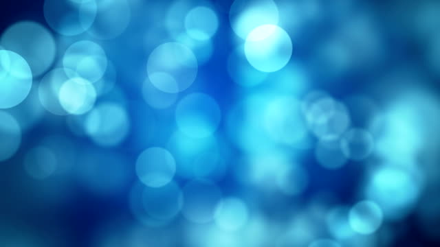 Moving blue glitter lights, defocused light reflections loopable bokeh background