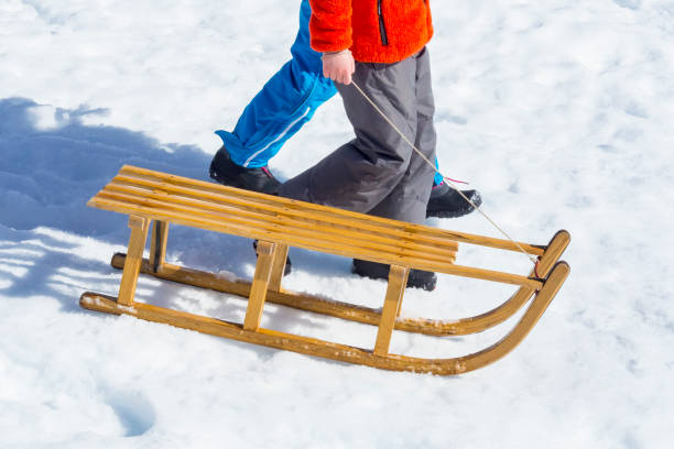 istock Wood sled on the snow 971610400