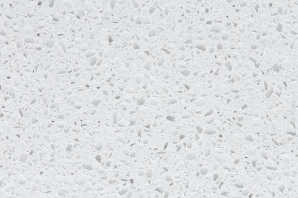 istock Fresh snowy wthite texture synthetic stone 971610878