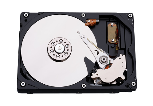 Real open hard drive isolated on white background. High resolution photo.
