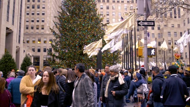 Video of The Christmas Tree in Rockefeller Center With Large Groups Of Tourists