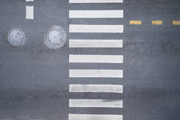 Aerial photo top view over pedestrian crossing on traffic road stock photo