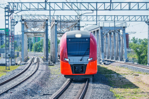 istock Highspeed train moves on the bridge. 971640274