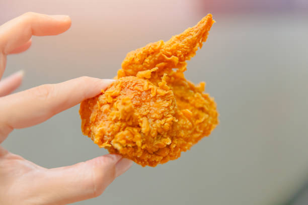 istock Chicken wing fried delicious tasty closeup 971662912