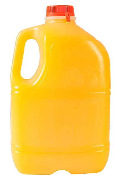 Plastic bottle full of orange juice. Clipping path included.