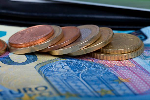 istock A wallet with coins and euro bills 971665874