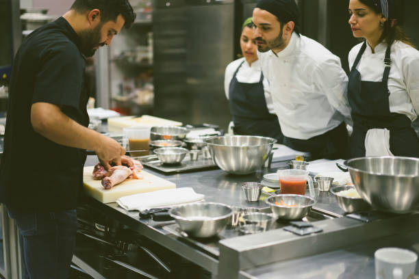 istock the chef describes the techniques of cutting meat 971670036
