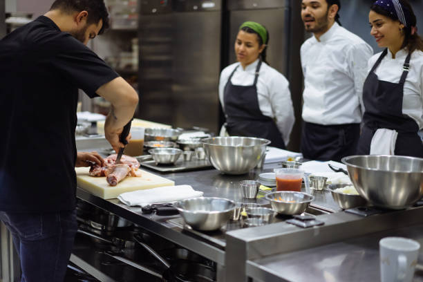 istock the chef describes the techniques of cutting meat 971670140