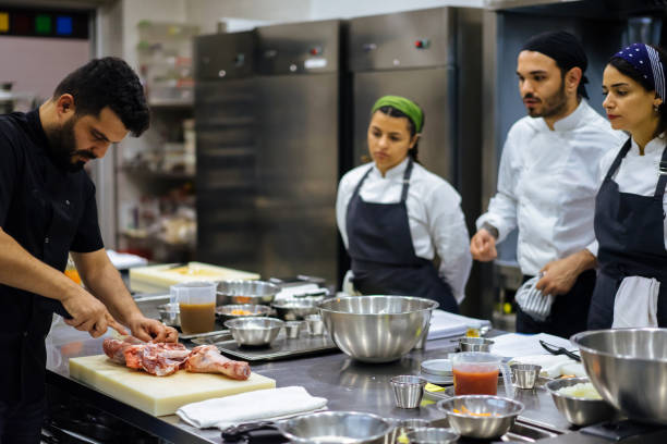 istock the chef describes the techniques of cutting meat 971670188