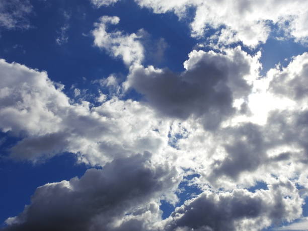 istock Wonderful blue sky with white and gray clouds 971672814