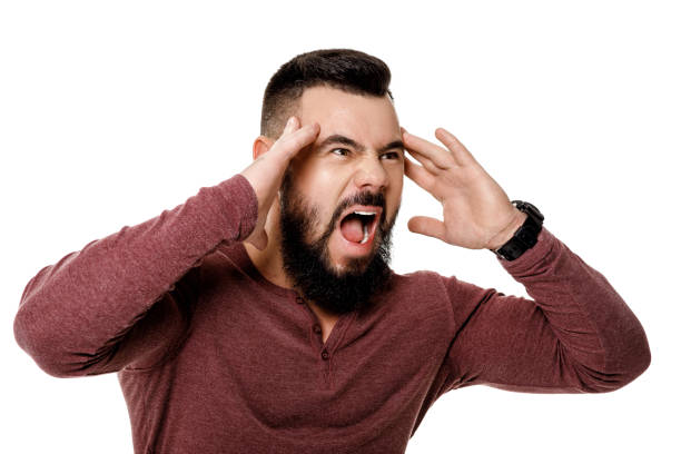 istock bearded man screaming on white background. 971679518