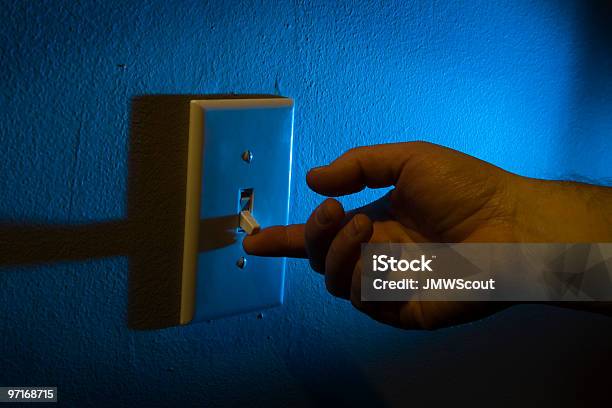 Turning On The Light Switch Stock Photo - Download Image Now - Light Switch, Dark, Illuminated